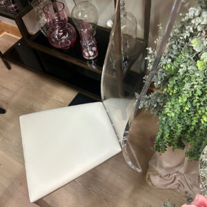 Elegant chair with clear acrylic back and white cushioned seat for weddings and events by SWFL Wedding & Event Rentals Fort Myers, Fl