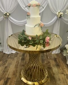 a cake on a table SWFL Wedding & Event Rentals
