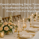 Elegant Southwest Florida wedding reception table featuring blush and ivory floral arrangements, gold candleholders, and soft ambient lighting, showcasing 2025–2026 wedding décor trends in Fort Myers. Landscape orientation, optimized for web and Google updates